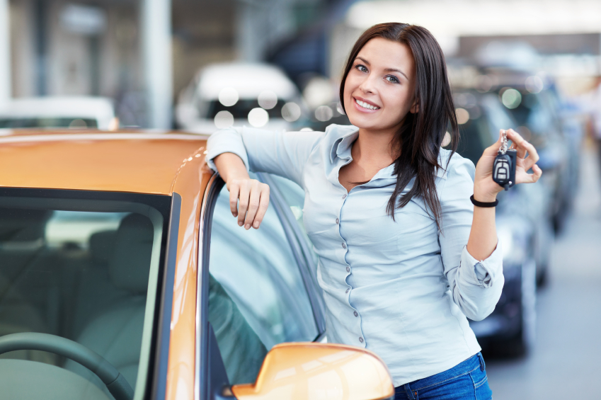 Beautiful girl with car keys